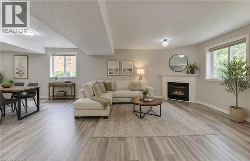 VIRTUALLY STAGED  Lower level (walkout basement) living room - 26 Stanmore Avenue, Kitchener, ON 