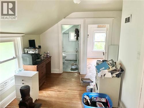 Bedroom  flooring, painted walls, and window with natural light - 128 Kent Street S, Simcoe, ON 