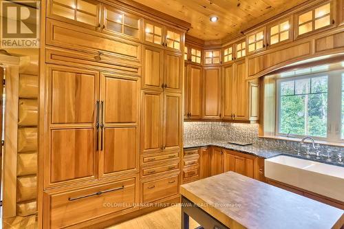 Refrigerator integrated into surrounding cabinetry - 2467 Darling Road, Lanark Highlands, ON 