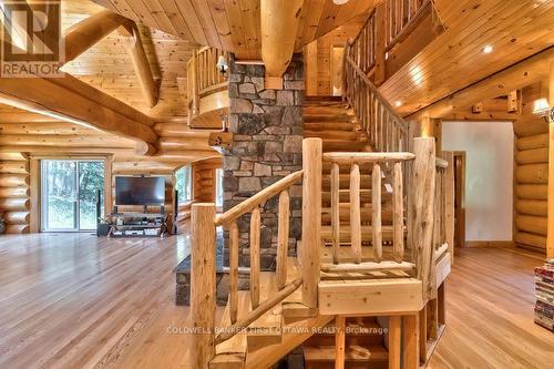 Log staircase to second floor - 2467 Darling Road, Lanark Highlands, ON 