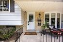 Brick and siding exterior with a covered entry - 2037 Mountain Grove Avenue, Burlington, ON 