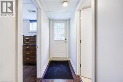 White paneled entry door with glass inserts - 