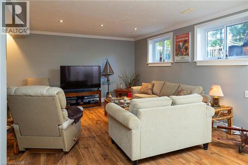 Recessed lighting, crown molding, wood-finish flooring, and white trim windows - 78 Berkley Crescent, Simcoe, ON 
