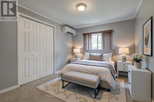 This photo has been virtually staged. - A4 - 4838 Switzer Drive, Southwest Middlesex, ON 