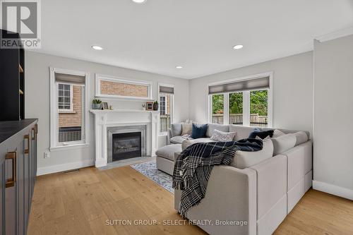 Living room with large bright windows - 121 Tanoak Drive, London North (North E), ON 