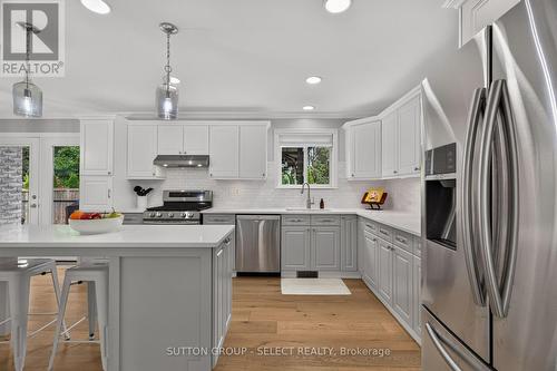 Spacious functional kitchen with ample cabinetry - 121 Tanoak Drive, London North (North E), ON 