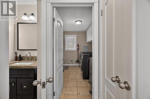 Main floor laundry room + powder room - 121 Tanoak Drive, London North (North E), ON 