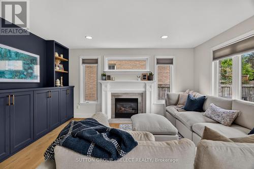 Living room custom built-ins + gas fireplace - 121 Tanoak Drive, London North (North E), ON 