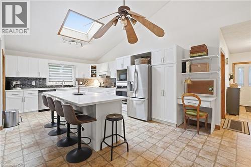 Vaulted ceiling with skylight and ceiling fan - 76 Madeira Crescent, Cambridge, ON 