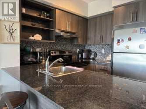 827 - 120 DALLIMORE CIRCLE , Toronto, Ontario M3C 4J1 4