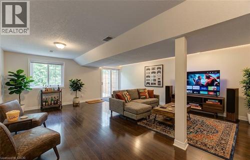 Rec Room Digitally Staged - 25 Bankside Drive Unit# 2, Kitchener, ON 