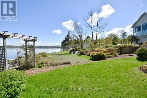 Enjoy a professionally landscaped yard - 3021 Sandy Bend, Springwater, ON 