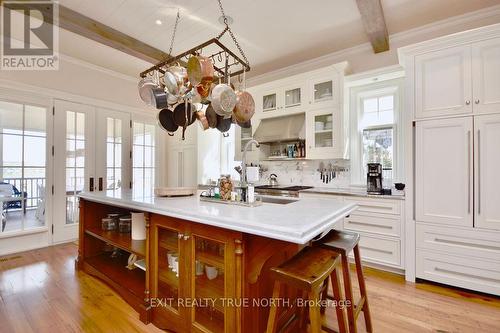 The chef's kitchen anchors the home - 3021 Sandy Bend, Springwater, ON 