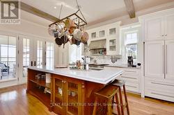 The chef's kitchen anchors the home - 