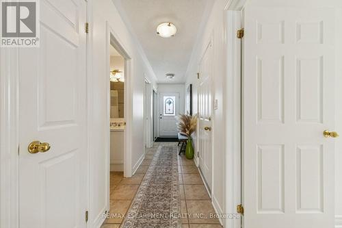 Hallway looking towards front door - 245 Centennial Forest Drive, Milton, ON 