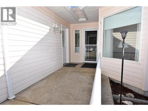 Front door and side door to garage - 5309 21 Street, Vernon, BC 