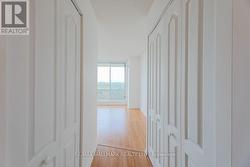 Primary His/Hers Closets - 