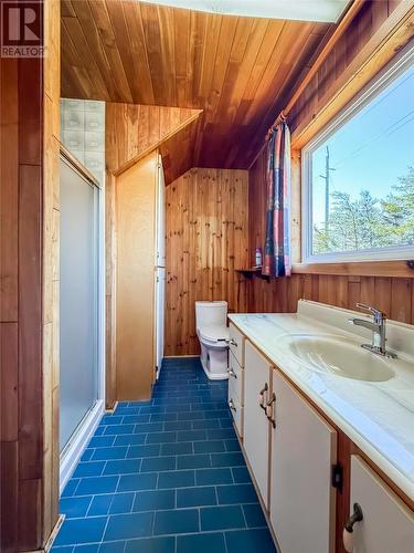 Full bathroom with doors leading to bedroom and hallway - 157 Kimberley Farm Drive, Winterland, NL 