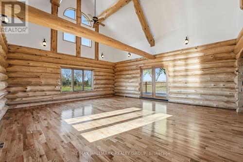 Living room with walkout to covered porch - 11709 County  38 Road, North Dundas, ON 