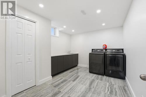 Large laundry room with sink - 11709 County  38 Road, North Dundas, ON 