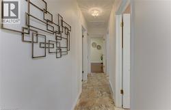 Recessed ceiling lighting, a decorative semi-flush mount light fixture, and tile flooring - 