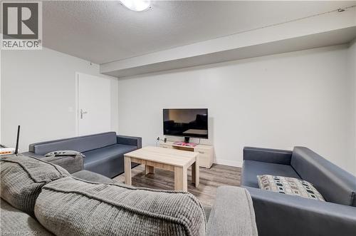 Hardwood-style flooring in a multi-tone finish - 338 Albert Street Unit# 114, Waterloo, ON 