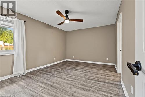 Wood-finish flooring with a neutral wall palette - 141 Race Street, Paris, ON 