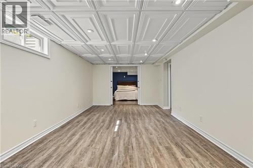 Wood-finish flooring, recessed lighting, and a white paneled ceiling - 141 Race Street, Paris, ON 