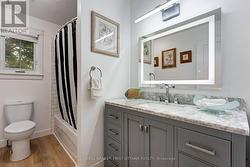 Main floor 4pc bathroom with new vanity - 