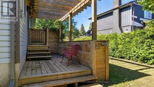 Backyard porch with built-in planters - 25 Robert Road, Perth, ON 