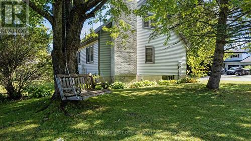 Spacious side yard, as a cozy extra spot - 25 Robert Road, Perth, ON 