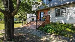 Stone walkway leading to inviting porch - 