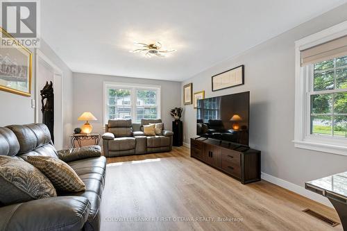 Large living room with plenty of natural light - 25 Robert Road, Perth, ON 