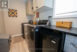 MAIN FLOOR LAUNDRY-ACCESS TO GARAGE - 