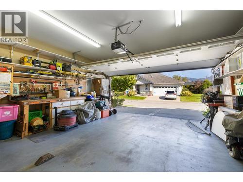 Double attached garage with convenient interior access. - 1188 Houghton Road Unit# 122, Kelowna, BC 
