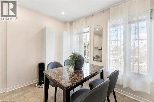 Recessed lighting and multiple windows with sheer drapery - 123 Brickyard Way, Brampton, ON 