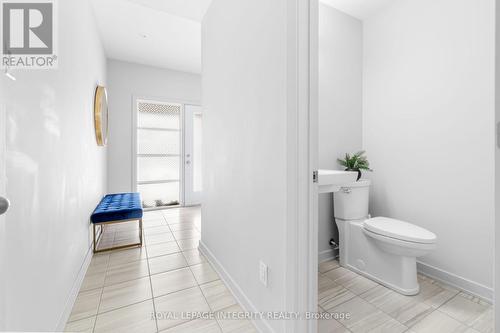 Foyer reversed facing half bathroom - 641 Odyssey Way, Ottawa, ON 