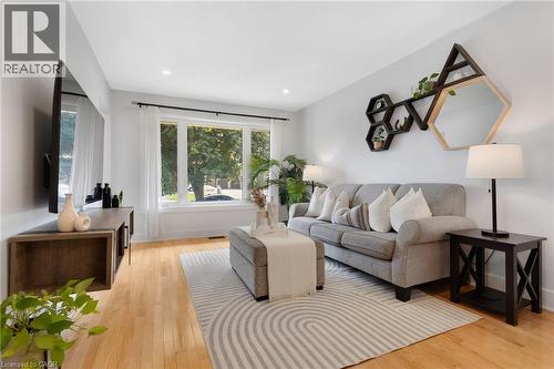 Recessed lighting, wood-finish flooring, and white walls - 477 Kingscourt Drive Unit# B, Waterloo, ON 