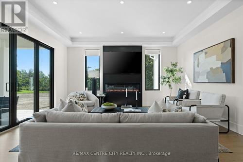 Elegant electric fireplace with coffered ceilings - 53900 Heritage Line, Bayham (Richmond), ON 