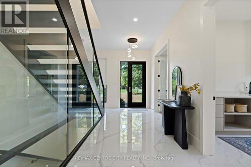 Show-Stopping glass staircase in entrance - 53900 Heritage Line, Bayham (Richmond), ON 