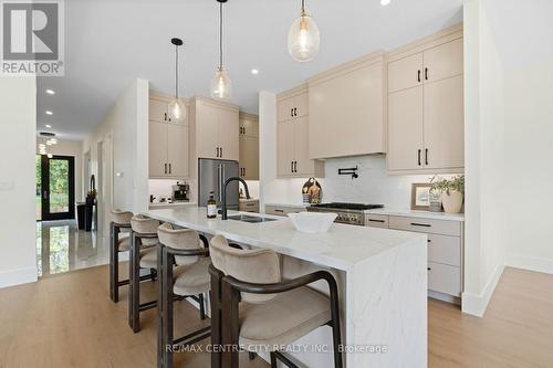 A kitchen that never ends, winding around corner - 53900 Heritage Line, Bayham (Richmond), ON 