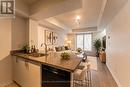 Kitchen and Living Room (virtually staged) - 651 - 3 Everson Drive, Toronto, ON 