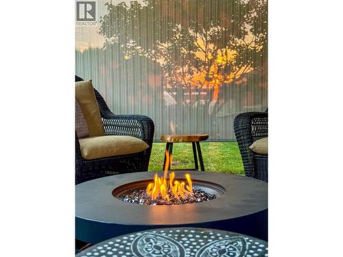 Pull-down shades keep the warmth in in the evenings or fall days! - 1113 Mt Fosthall Drive, Vernon, BC 