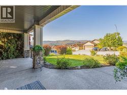 spacious and inviting front patio ~ so many lounging areas! - 