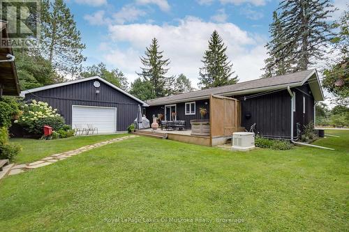 Rear side of the house and garage - 2 Leslie Drive W, Bracebridge (Monck (Bracebridge)), ON 