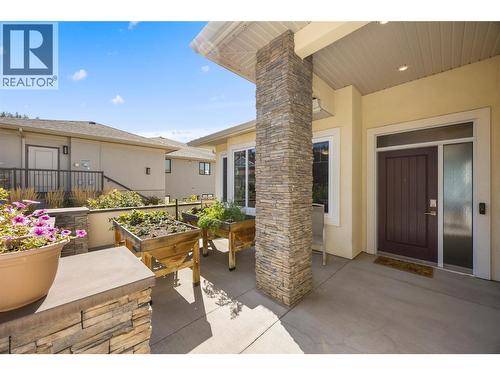 Front courtyard with flower beds - 2442 Bella Vista Street, Kelowna, BC 