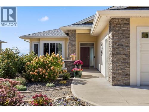 Gorgeous curb appeal with a low maintenance front yard and courtyard with garden beds - 2442 Bella Vista Street, Kelowna, BC 