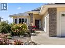 Gorgeous curb appeal with a low maintenance front yard and courtyard with garden beds - 2442 Bella Vista Street, Kelowna, BC 