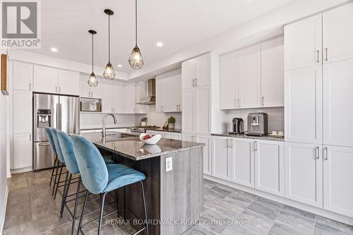 Chef-inspired kitchen with extensive cabinetry - 210 Pingwi Place, Ottawa, ON 