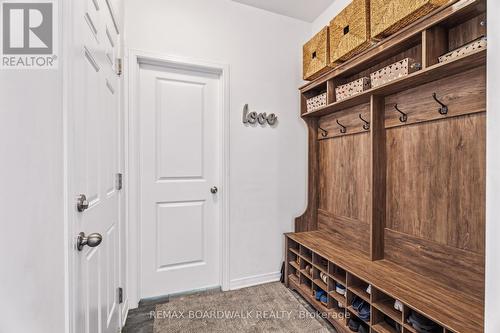 Practical mudroom with built-in storage - 210 Pingwi Place, Ottawa, ON 